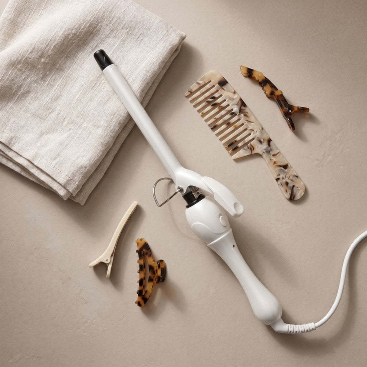 Twirl Mini Curling Iron flat lay